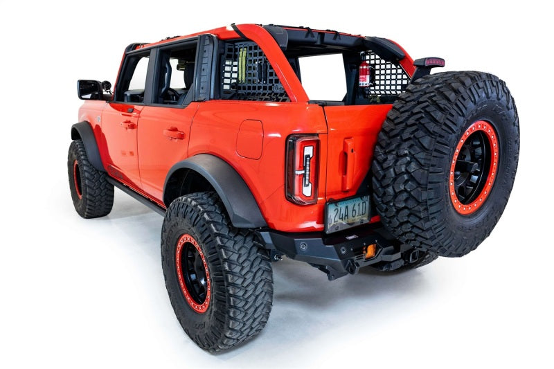 Addictive Desert Designs21-23 Ford Bronco & Bronco Raptor Rear Window Molle Storage Panels on a modified off-road Bronco.