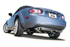 Borla 06-14 Mazda MX-5 Miata 2.0L RWD Twin-Tip Cat Back Exhaust installed on a silver convertible car.