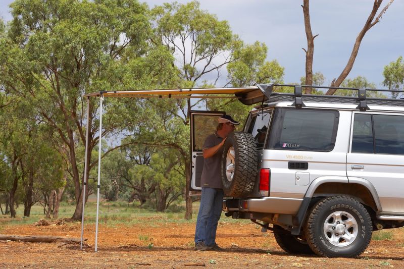ARB Awning Pvc Bag 1.25M49Lg Usa/Ca Spec 1250X2100mm49X83 on SUV in wilderness setting