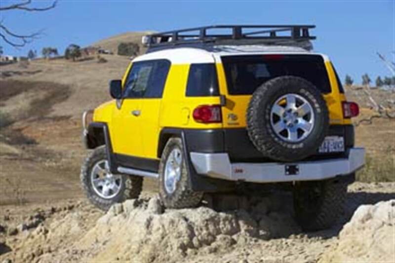 ARB Rear Bar Fj Us Spec (Fit Kit NOT Included) on yellow off-road vehicle.