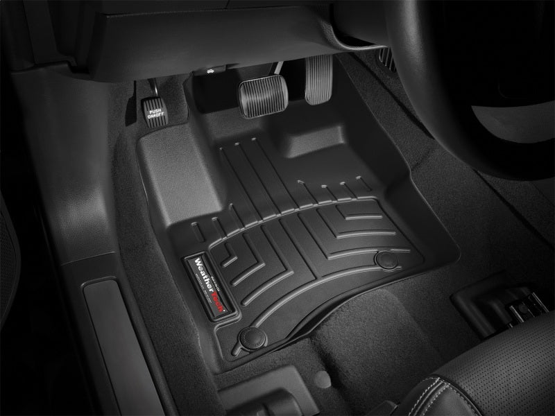 WeatherTech 10+ Ford Taurus Front FloorLiner - Black installed in vehicle