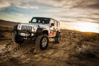 Fox 07-18 Jeep JK 2.5 Perf Elite Series Reservoir Shock Front 2.5in R/R 2.5-4in (Pair) w/ DSC Adj. in off-road setting.