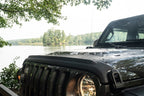 Bushwacker 18-19 Jeep Wrangler Rubicon/Sport//Unlimited/Sport S Hood Stone Guard- Black on scenic lake background