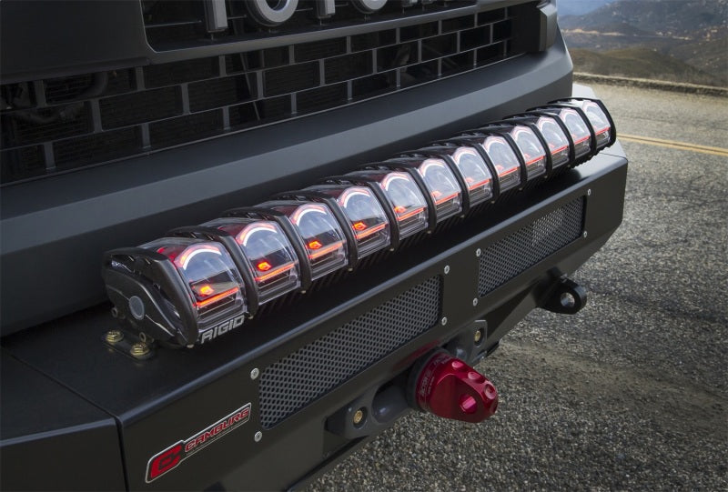 Rigid Industries 50in Adapt Light Bar on a vehicle front grill.