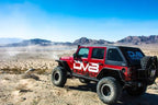 DV8 Offroad 07-18 Jeep Wrangler JK Front & Rear Flat Tube Fenders on an offroad Jeep in desert scenery.