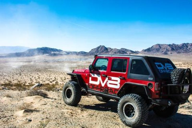 DV8 Offroad 07-18 Jeep Wrangler JK Front & Rear Flat Tube Fenders on an offroad Jeep in desert scenery.