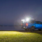 ARB BaseRack Auxiliary Light - 2.8in 20W on blue truck at night