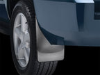 WeatherTech 07-13 Chevrolet Tahoe No Drill Mudflaps - Black installed on tire