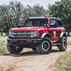 Rigid Industries 2021+ Ford Bronco Dual Pod A-Pillar Mount Kit M617 on a red Ford Bronco in offroad setting