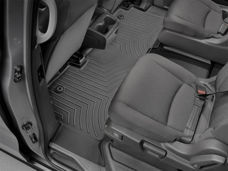 WeatherTech 2018+ Honda Odyssey Rear FloorLiner - Black (Fits 7/8 Passenger Models) in vehicle interior.