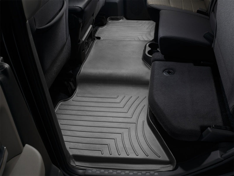 WeatherTech 09+ Dodge Ram 1500 Crew Cab Rear FloorLiner - Black installed in truck interior.