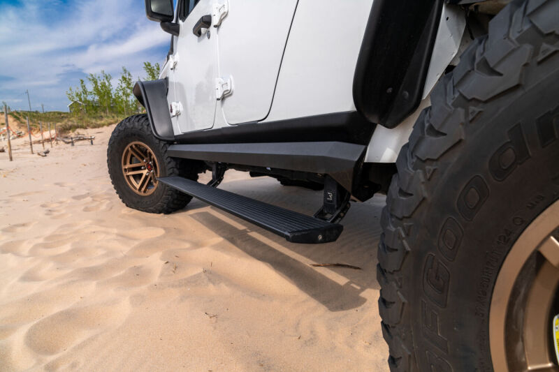 AMP Research 2007-2018 Jeep Wrangler JKU 4DR PowerStep XL - Black (Incl OEM Style Illumination) Secondary image