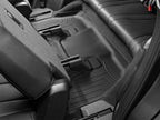 WeatherTech 22-24 Acura MDX Rear FloorLiner - Black installed in back seat of vehicle.