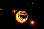DV8 Offroad 2018+ Jeep Wrangler JL/Gladiator LED Projector Headlights showcasing bright illumination.