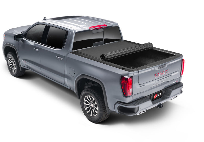 BAK 19-21 Chevy Silverado/GM Sierra Revolver X4s 5.10ft Bed Cover (New Body Style) on stylish gray truck