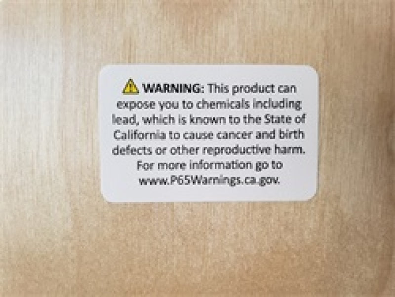 Warning label about chemical exposure risk including lead.