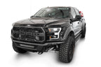 Addictive Desert Designs17-20 Ford F-150 Raptor Phantom Front Bumper on a lifted truck with offroad tires and accessories.