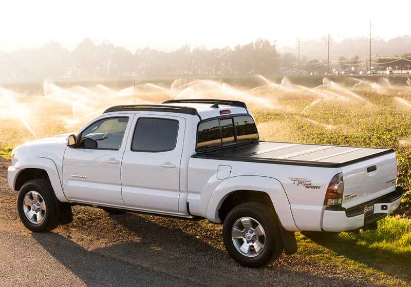 BAK 2024 Toyota Tacoma 5ft Bed BAKFlip G2 on road