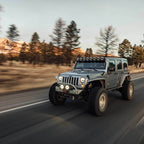 KC HiLiTES Gravity Titan LED 6in. - Pair Pack (SAE Driving Beam) on Jeep driving off-road.