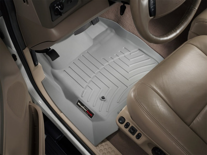 WeatherTech 99-07 Ford F250 Super Duty Crew Front FloorLiner - Grey installed in truck interior