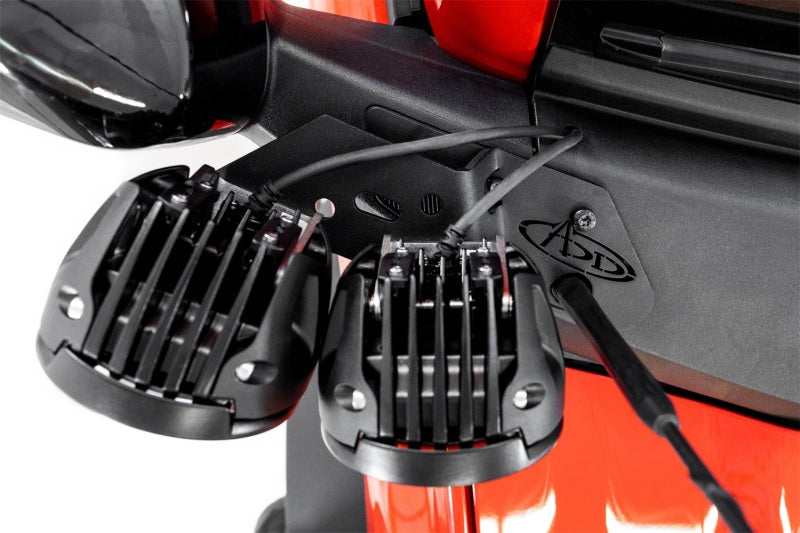 Addictive Desert Designs21-23 Ford Bronco/Raptor Dual Ditch Light Brackets with pod lights mounted