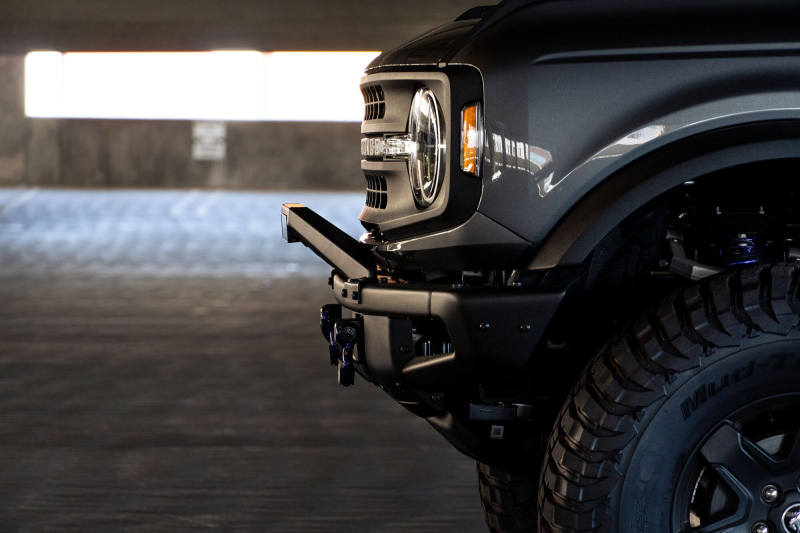 DV8 Offroad 21-22 Ford Bronco Factory Modular Front Bumper Bull Bar on an off-road vehicle