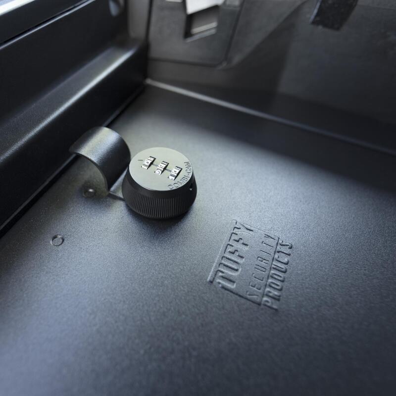 Tuffy Console Safe W/ Combo Lock For Ford Fseries Flow Thru Console close-up with combination dial