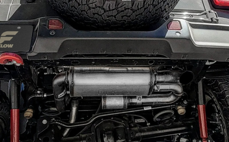 MagnaFlow 18-23 Jeep Wrangler JL 2.0L/3.6L Overland Series Axle-Back Exhaust system installed for offroad performance.
