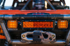 Rigid Industries Protective Polycarbonate Cover - Dually/D2 - Yellow on offroad vehicle with lighting and recovery gear.