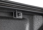 Close-up of BAK 21-24 Ford F-150 5.7ft. Bed BAKFlip Revolver X4ts hardware.