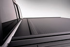 Retrax 09-up Ram 1500 6.5ft Bed / 10-up Short Bed RetraxONE MX on truck bed, showcasing durable design and matte finish.