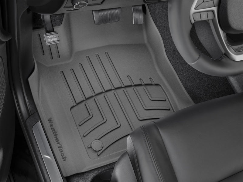 WeatherTech 2016+ Dodge Durango / Jeep Grand Cherokee Front FloorLiner HP - Black in car interior