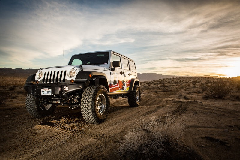 Fox 97-06 Jeep TJ 2.0 Performance Series 9.6in. Smooth Body IFP Front Shock / 3-4.5in & 2-3.5in Lift on offroad Jeep.