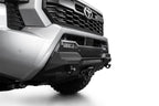 Addictive Desert Designs 2024 Toyota Tacoma Stealth Center Mount Winch Front Bumper with offroad lighting.