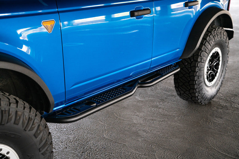 DV8 Offroad 21-22 Ford Bronco OE Plus Series Side Steps on blue truck