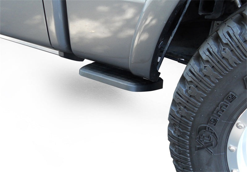 AMP Research 20-24 Chevrolet Silverado 2500/3500HD BedStep2 - Black truck step installation on offroad vehicle