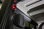 Fishbone Offroad Roll Bar Flashlight Holder in a Jeep interior