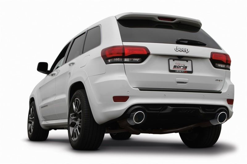 Borla 2015 Jeep Grand Cherokee SRT8 ATAK Dual Round Rolled Exit Catback Exhaust on a white Jeep SUV.