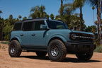 ICON Compression 17x8.5 6x5.5 25mm Offset 5.75in BS 95.1mm Bore Titanium Wheel on a custom Bronco