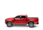 BAK 2024 Toyota Tacoma 6ft Bed BAKFlip MX4 Bed Cover on red truck