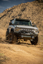 DV8 Offroad 2021 Ford Bronco A Pillar Dual Light Pod Drop Mounts in action on offroad terrain