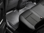 WeatherTech 2016+ Nissan Titan XD Crew Cab Rear FloorLiner - Black in vehicle interior.