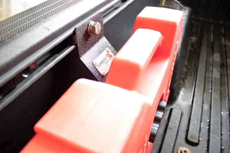 Fishbone Offroad Tacoma In Bed Rotopax Mount with red containers