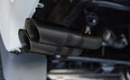 MagnaFlow 22+ Toyota Tundra Street Series 3in Dual Driver Side Rear Cat-Back Exhaust tips close-up view.