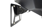 Addictive Desert Designs Clevis Mounted Front License Plate Bracket close-up, designed for offroad vehicles and trucks.
