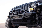 DV8 Offroad 18-23 Wrangler JL/Gladiator JT Spec Series Front Bumper with winch, perfect for offroad performance upgrades.