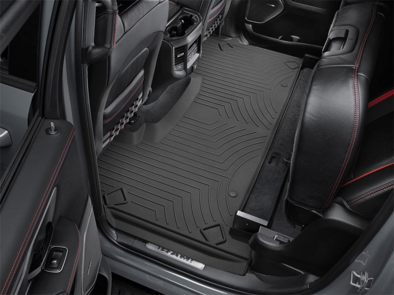 WeatherTech 2019+ RAM 1500 (Crew Cab w/ Rear Under Seat Storage) Rear FloorLiner HP - Black in vehicle interior.