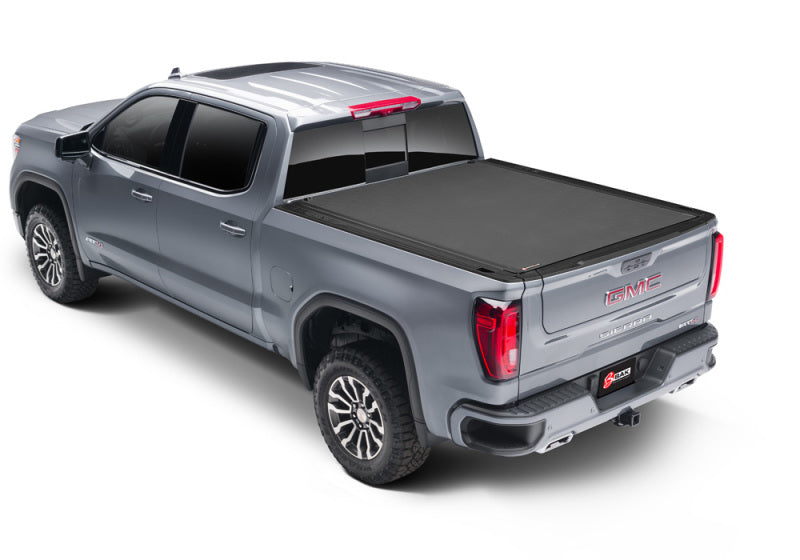 BAK 19-21 Chevy Silverado/GM Sierra Revolver X4s 5.10ft Bed Cover (New Body Style) on a silver truck.