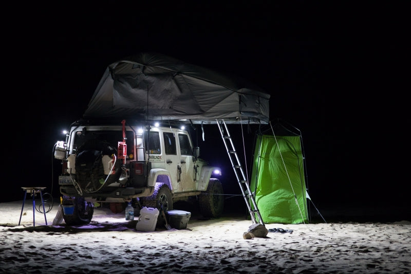 KC HiLiTES C-Series C2 LED 2in. Backup Area Flood Light 20w (Pair Pack System) - Black on off-road vehicle at night.