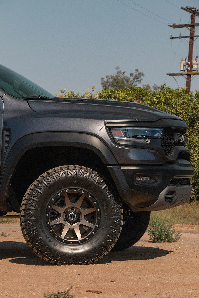 ICON Rebound 18x9 6x5.5 0mm Offset 5in BS 106.1mm Bore Bronze Wheel on offroad truck